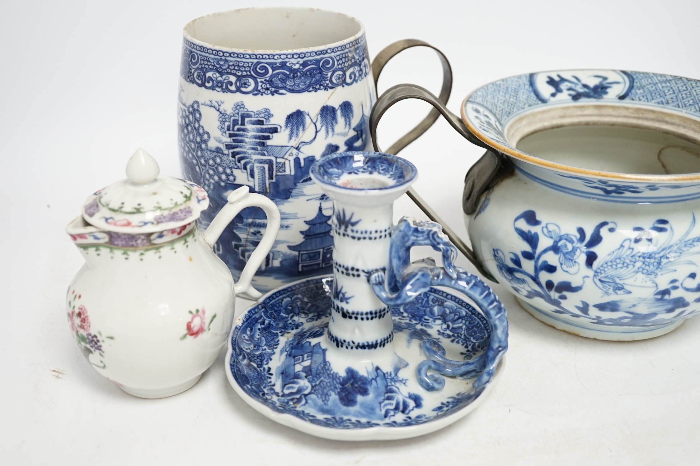A group of five 18th century Chinese export ceramics to include a rare blue and white ‘dragon’ chamberstick, tallest 16cm. Condition - poor